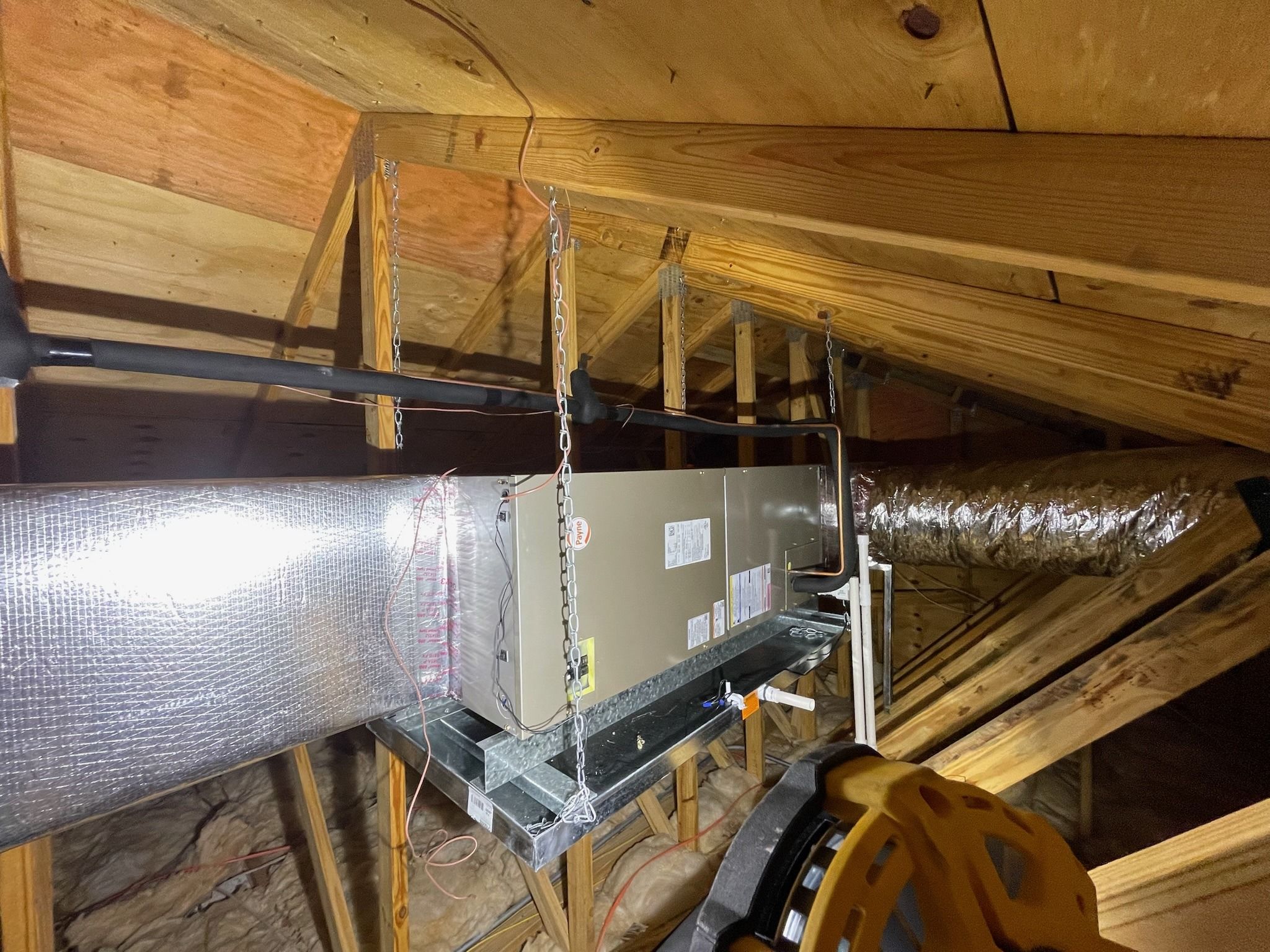 Air handler hung from the rafters in an attic, Next Level Air Conditioning job in Lake Worth, 2024