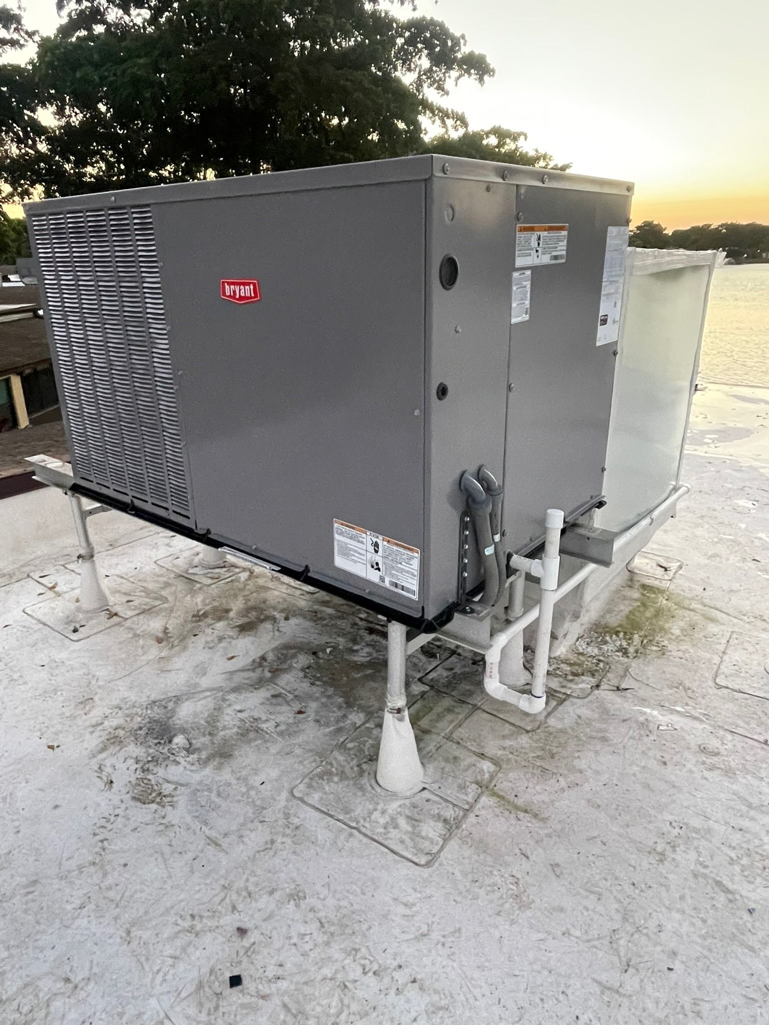 Bryant packaged rooftop unit on a flat roof, Next Level Air Conditioning job in Hollywood, 2023