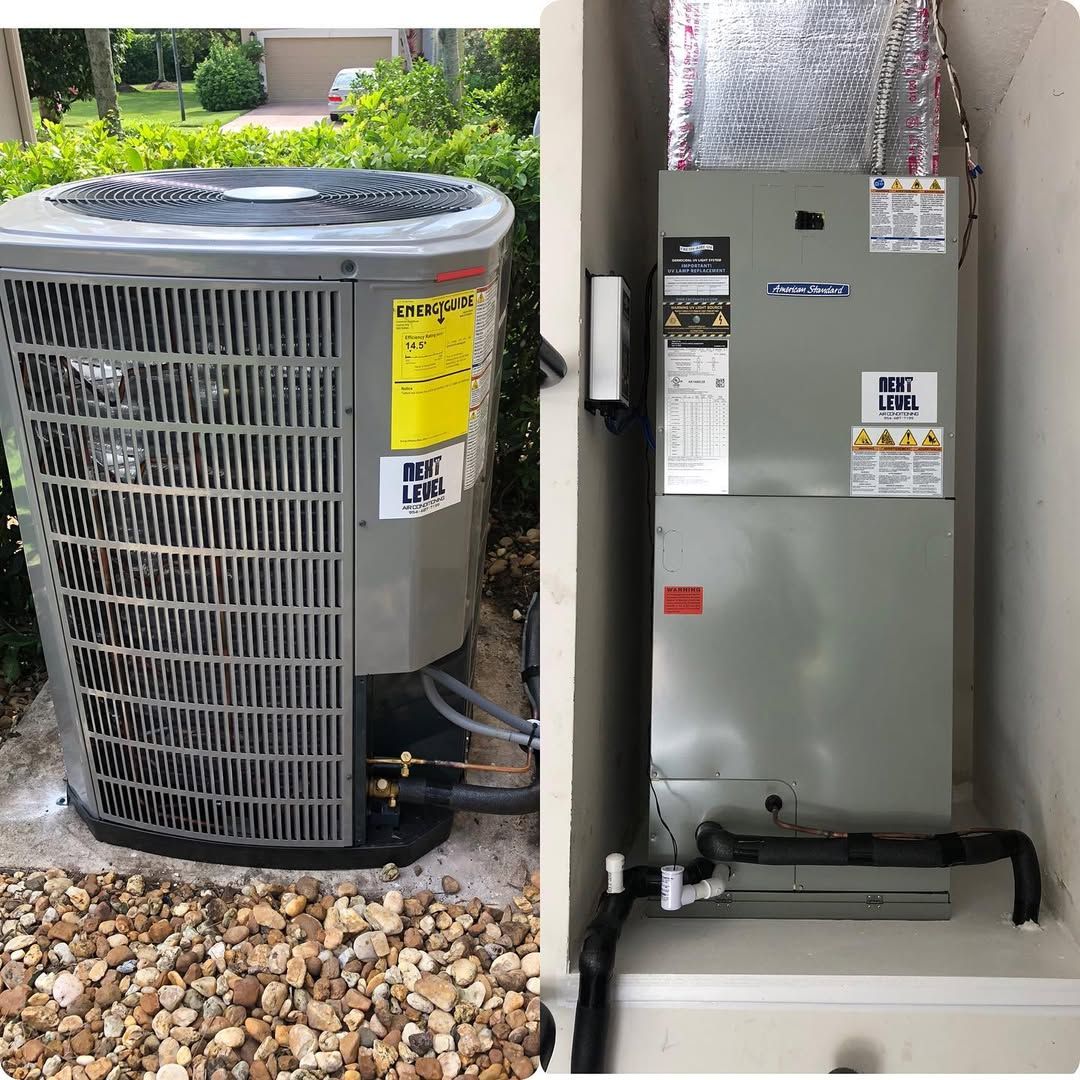 Condenser with a Next Level sticker beside an American Standard air handler carrying a germicidal UV light system label