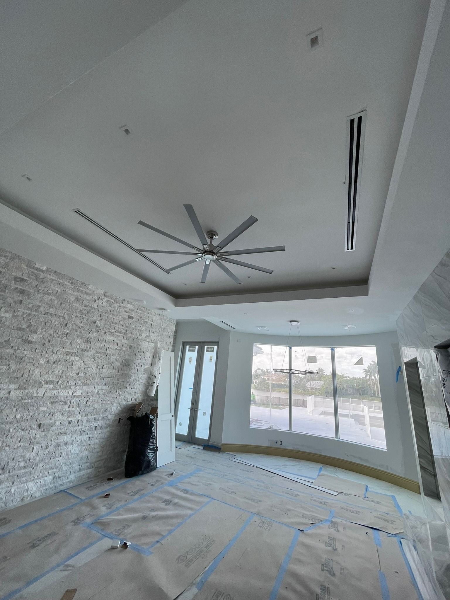 Linear slot diffusers in the tray ceiling of a new home under construction, Next Level Air Conditioning job in west Boca, 2024