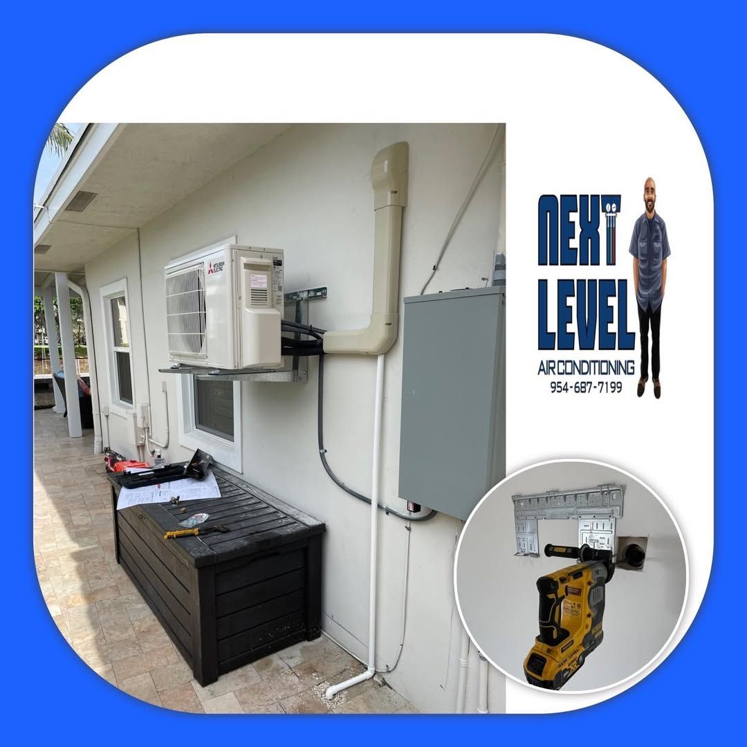 Mitsubishi mini-split condenser on a wall bracket with line hide, and a wall sleeve being cored