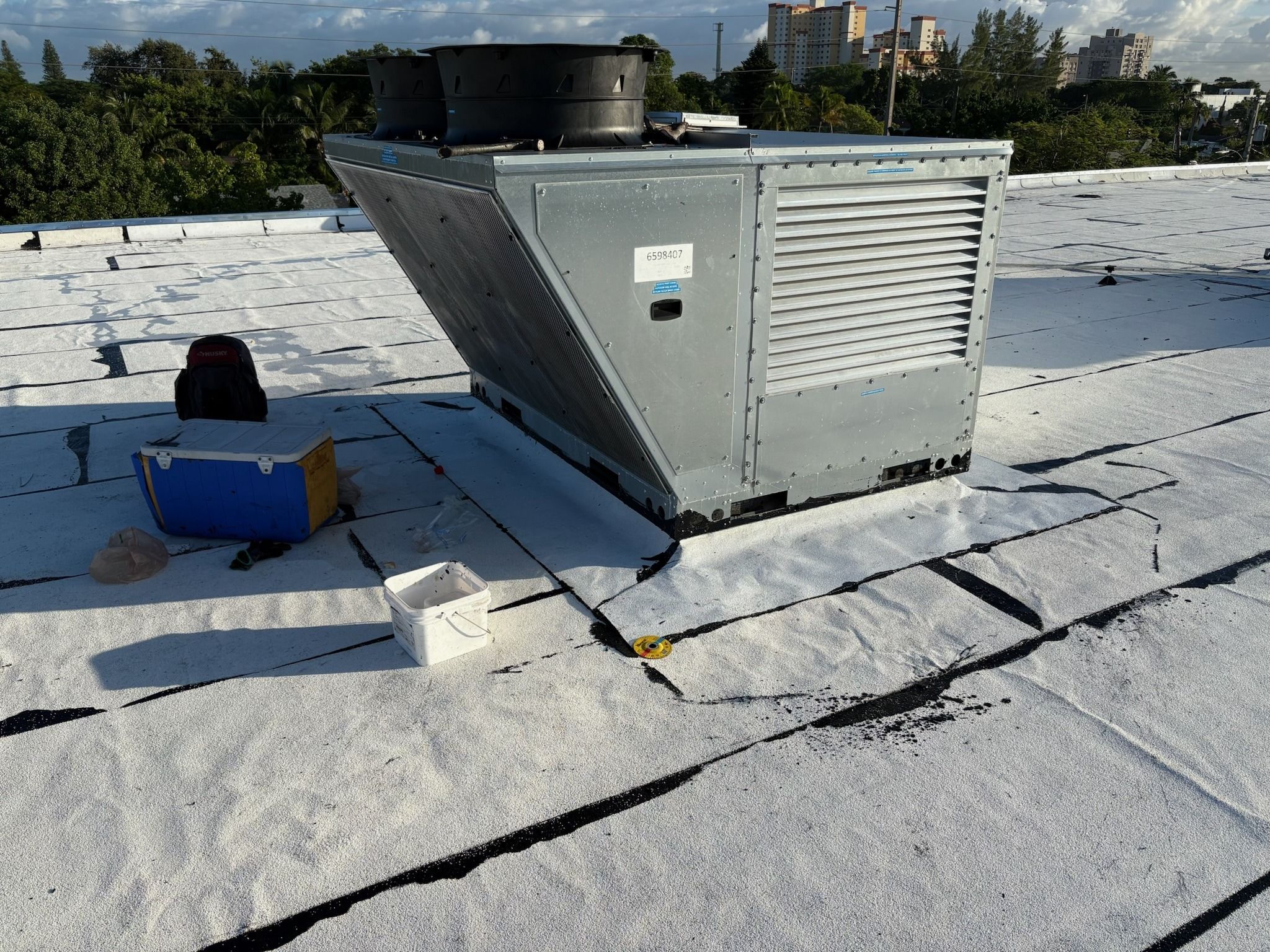 Rooftop unit on a curb on a new roof membrane